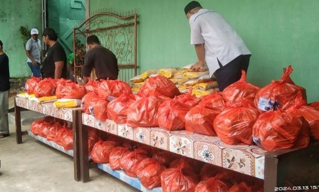 Kagama Lampung Bagikan 100 Paket Sembako Kepada Korban Banjir Gang Cinde