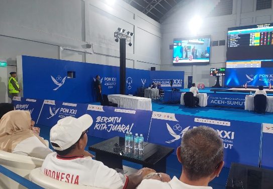 Motivasi Atlet Berlaga Di PON Aceh, Pj. Gubernur Saksikan Pertandingan Cabor Angkat Besi dan Muaythai