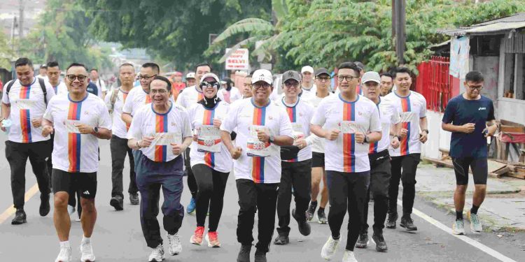 Pj. Gubernur Samsudin Lepas Peserta Gerakan Nasional Cerdas Keuangan (Gencarkan ) Run 2024