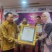 Kajari Lamsel Afni Carolina Raih Anugerah Sahabat Media dari SMSI