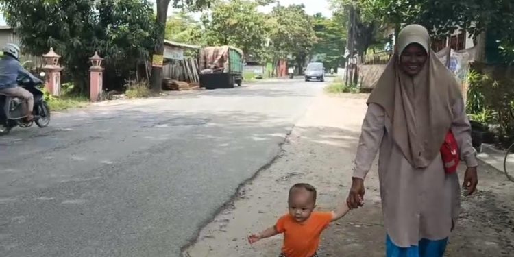 Warga Rasakan Manfaat Perbaikan Jalan di Bandar Lampung